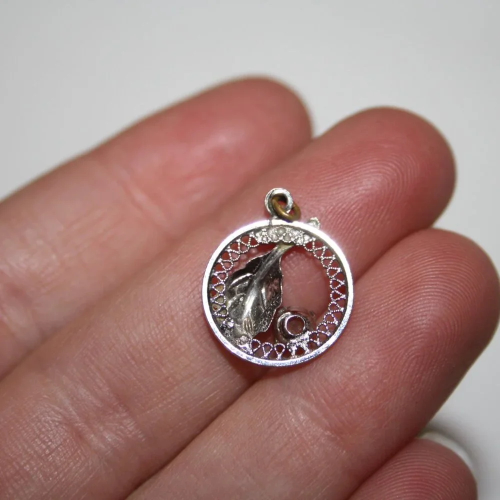 Beautiful vintage silver leaf and rhinestone pendant .75